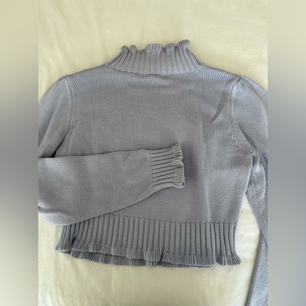 Purple 525 frilled turtle neck sweater